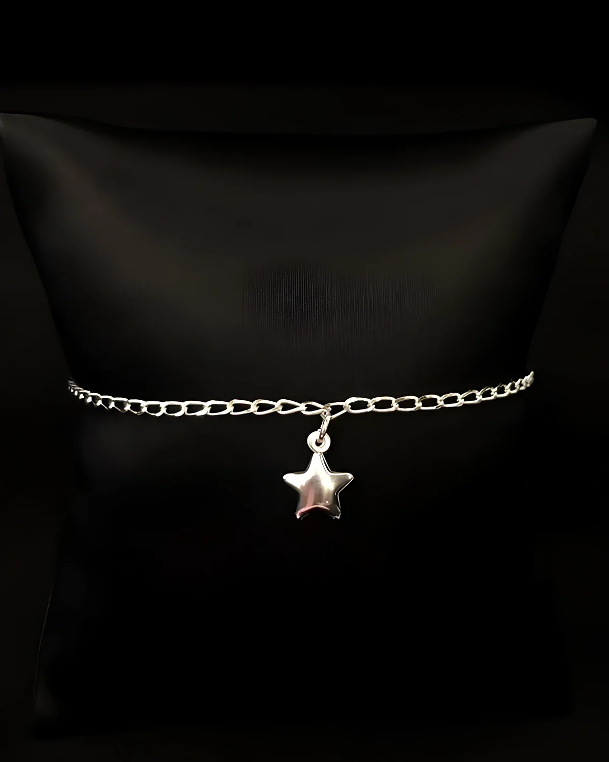 Pulseira infantil com 1 estrela pendurada